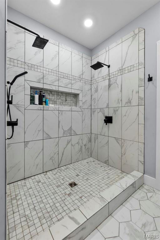 284 Ridge Rd, Oak Ridge, MO 63769 - bathroom featuring marble look tiles and a tile shower
