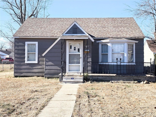 view of front of property with roof with shingles