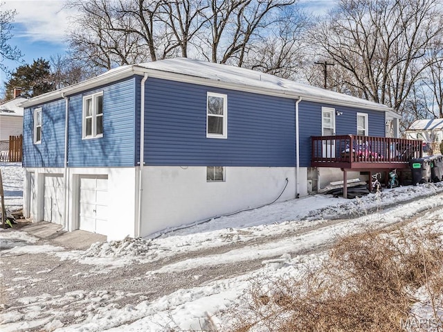 514 Penn St, Belleville, IL 62223 - snow covered property featuring a wooden deck