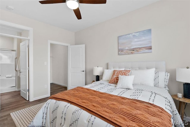 889 Walter Way, Washington, MO 63090 - bedroom with wood finished floors, a ceiling fan, baseboards, and connected bathroom