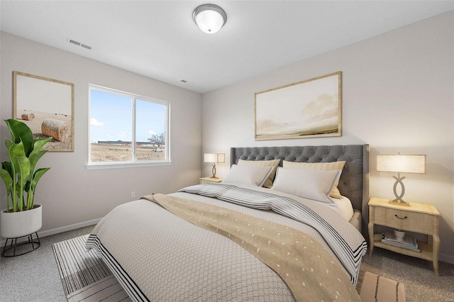 bedroom featuring carpet flooring and baseboards