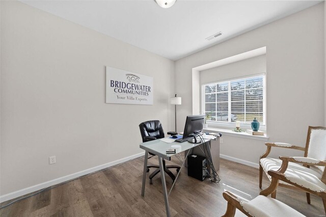office area featuring wood finished floors and baseboards