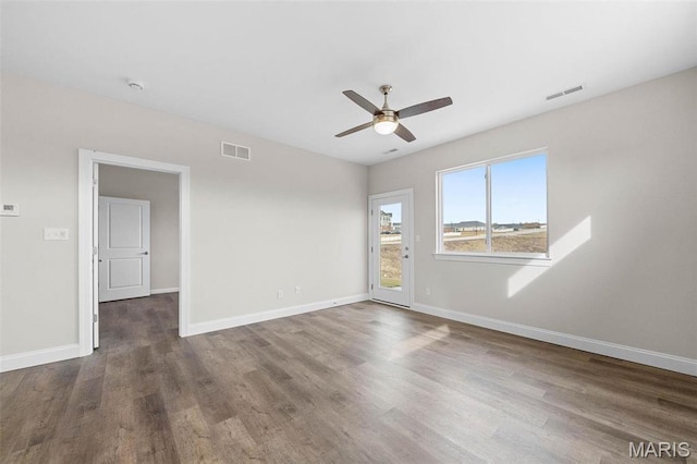 881 Walter Way, Washington, MO 63090 - empty room featuring wood finished floors, ceiling fan, and baseboards