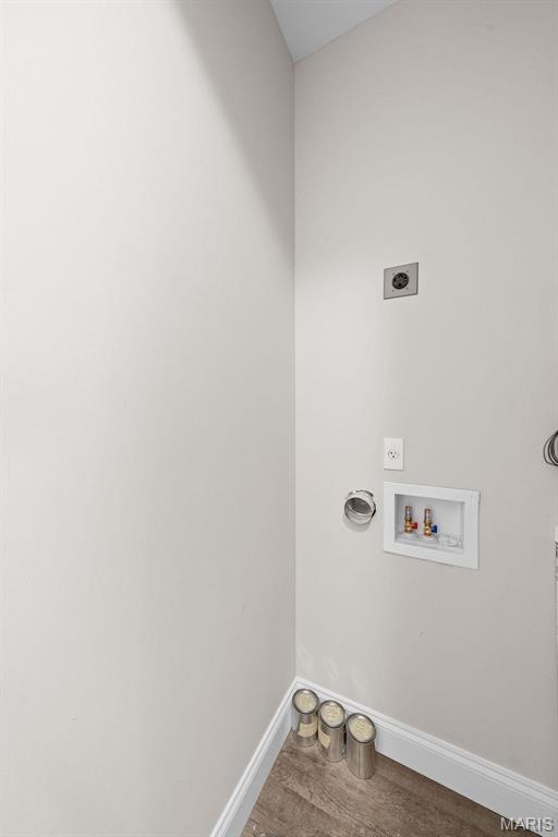 881 Walter Way, Washington, MO 63090 - washroom with electric dryer hookup, hookup for a washing machine, wood finished floors, and baseboards