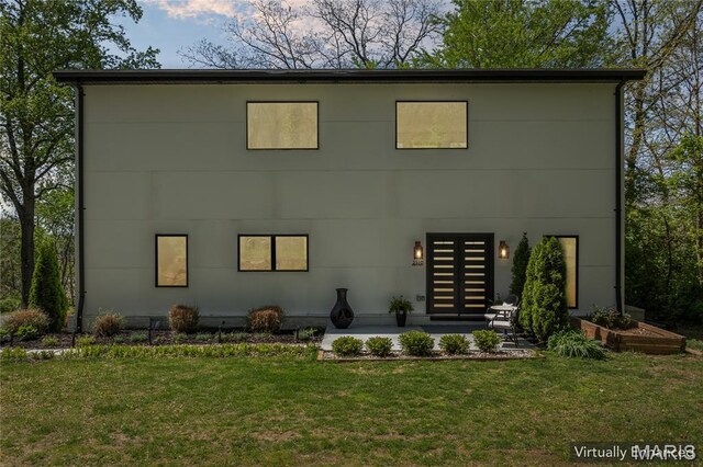 2510 N 89th St, Caseyville, IL 62232 - view of front of property featuring a front lawn and a patio