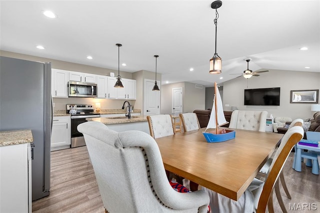 135 Mary Catherine, Waynesville, MO 65583 - dining space with light wood finished floors, ceiling fan, recessed lighting, and lofted ceiling