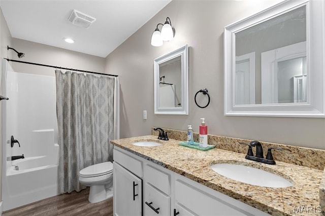 135 Mary Catherine, Waynesville, MO 65583 - bathroom with wood finished floors, shower / bath combo, and double vanity