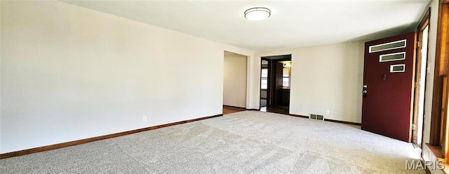 1606 New Madrid St, Cape Girardeau, MO 63701 - carpeted spare room with baseboards