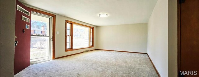1606 New Madrid St, Cape Girardeau, MO 63701 - unfurnished room with carpet floors and baseboards