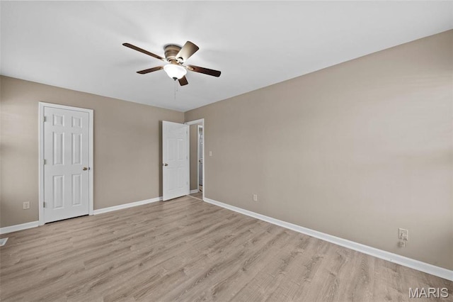 1619 Florine Boulevard E, Saint Charles, MO 63303 - unfurnished bedroom featuring light wood-style floors and a ceiling fan