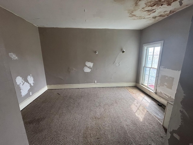 1809 Chestnut St, Hannibal, MO 63401 - spare room featuring carpet flooring and baseboards