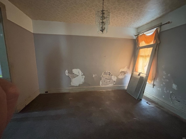 1809 Chestnut St, Hannibal, MO 63401 - spare room featuring a textured ceiling and baseboards