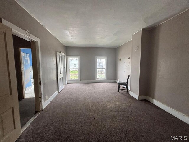 1809 Chestnut St, Hannibal, MO 63401 - carpeted spare room with baseboards and a smoke detector