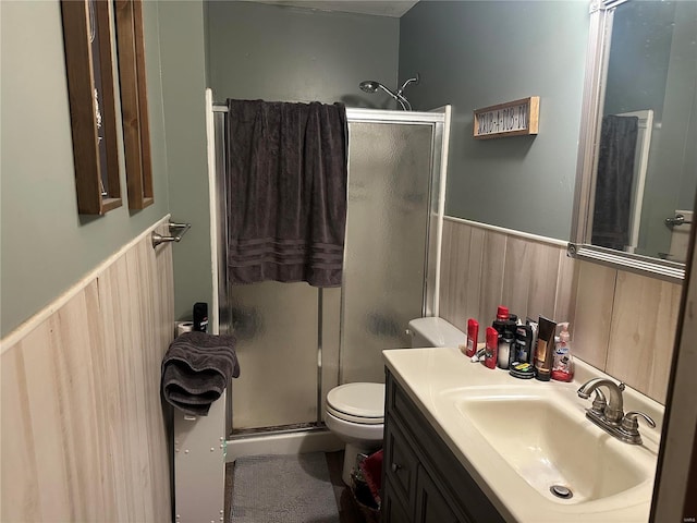 128 Pine St, Ironton, MO 63650 - bathroom featuring wainscoting, a shower stall, toilet, and vanity