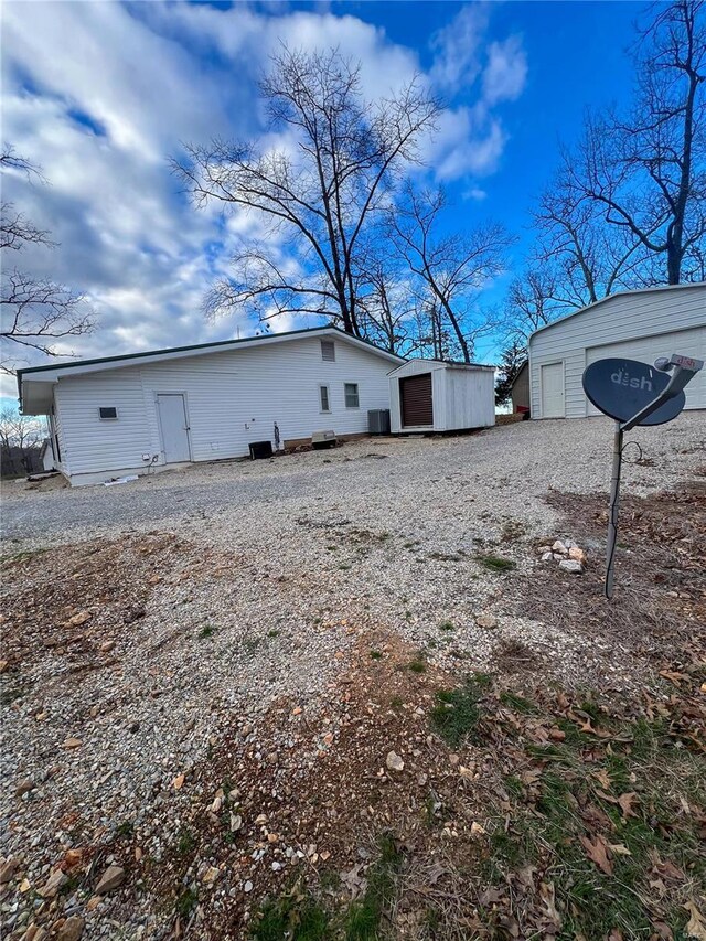13 Jo Ab Ln, Williamsville, MO 63967 - rear view of property with an outbuilding