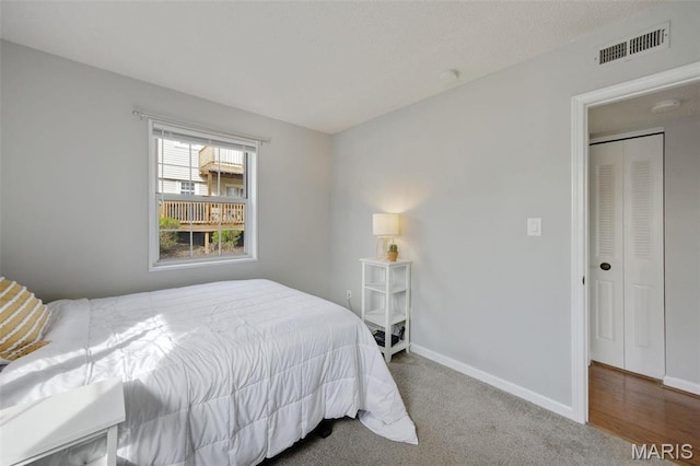 1419 Bluebird Ter, Saint Louis, MO 63144 - carpeted bedroom featuring baseboards