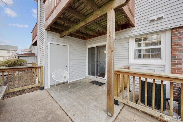 1419 Bluebird Ter, Saint Louis, MO 63144 - view of patio featuring central air condition unit