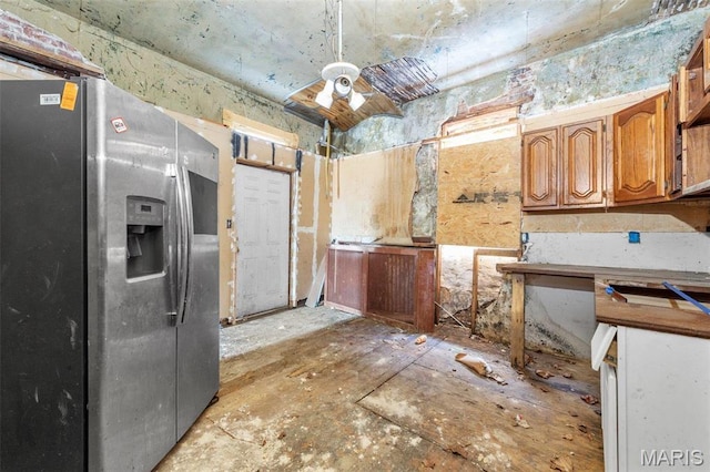 7307 Minnesota Ave, Saint Louis, MO 63111 - kitchen with stainless steel fridge with ice dispenser and brown cabinets