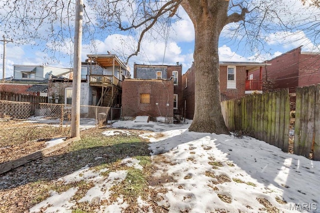 7307 Minnesota Ave, Saint Louis, MO 63111 - snow covered property with brick siding