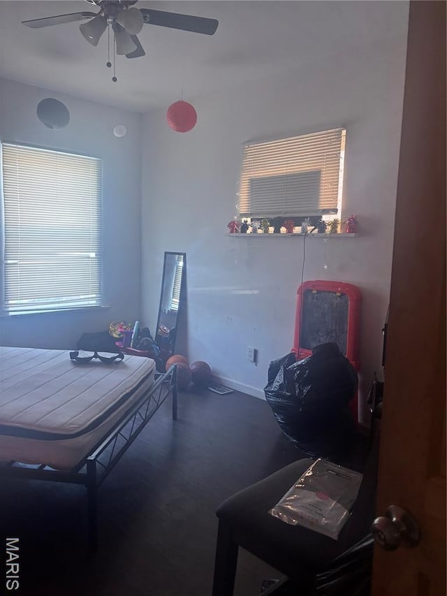 4600 Carrie Ave, Saint Louis, MO 63115 - bedroom featuring carpet flooring, a ceiling fan, and baseboards