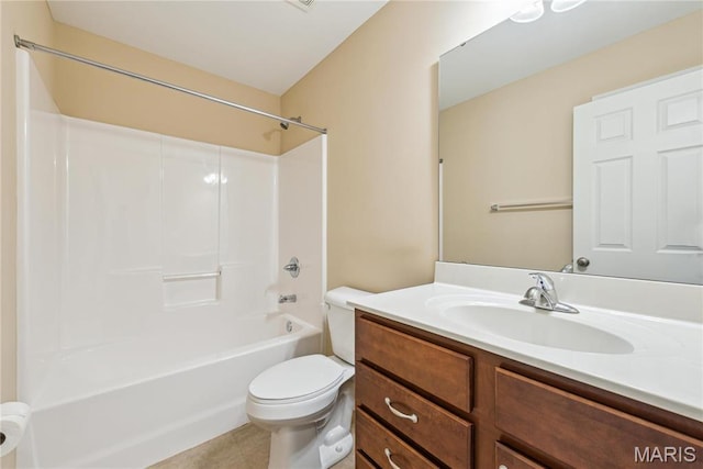 full bath featuring toilet, vanity, tile patterned floors, and  shower combination