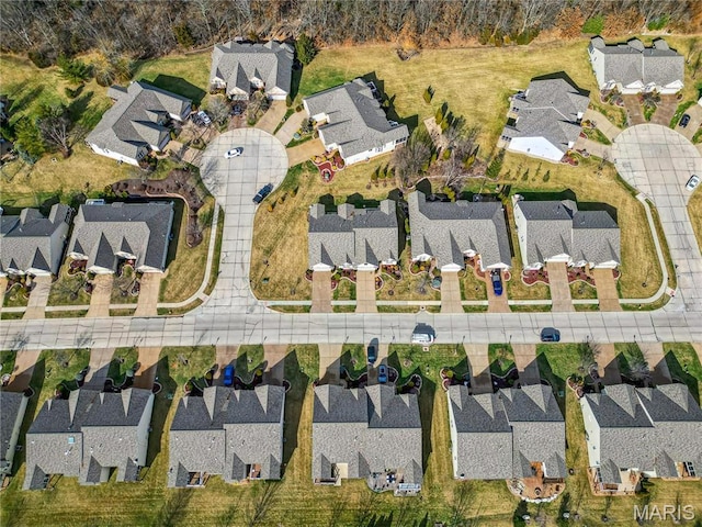 aerial view of property's location featuring nearby suburban area