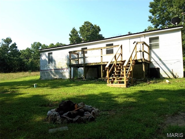 16625 Scott Ln, Willow Springs, MO 65793 - rear view of property with a deck, stairs, and a yard