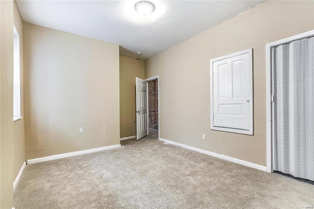 3018 Texas Ave, Saint Louis, MO 63118 - unfurnished bedroom featuring carpet flooring and baseboards