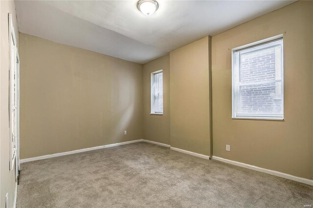 3018 Texas Ave, Saint Louis, MO 63118 - unfurnished room with plenty of natural light, carpet floors, and baseboards