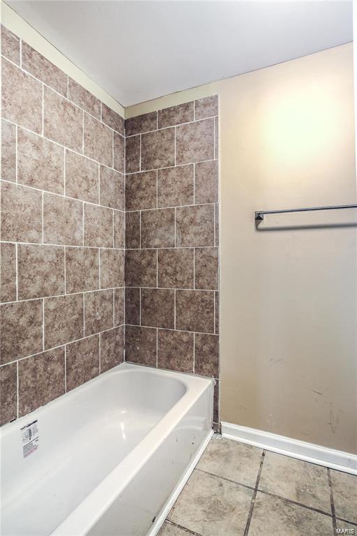 3018 Texas Ave, Saint Louis, MO 63118 - bathroom with baseboards and tile patterned floors