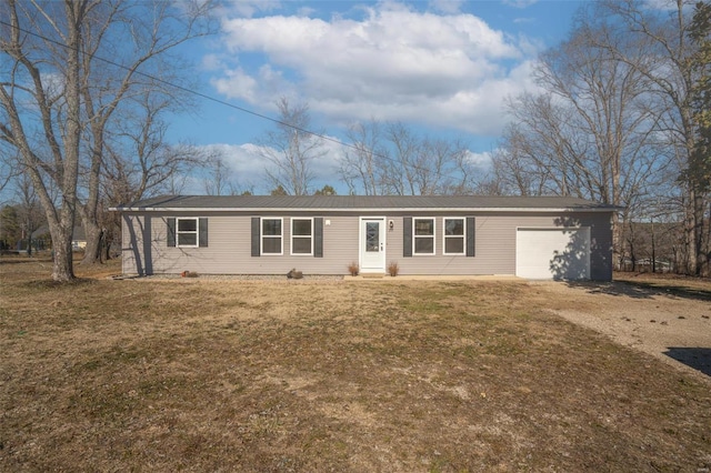 20 W Broadway, Ellsinore, MO 63937 - ranch-style house featuring a garage, driveway, and metal roof