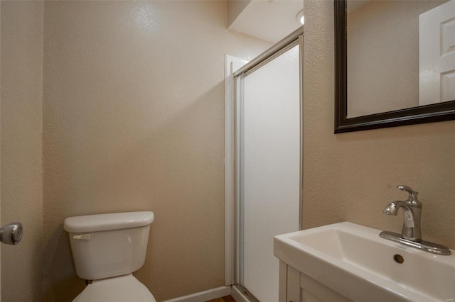 20 W Broadway, Ellsinore, MO 63937 - bathroom with a sink, toilet, and a stall shower