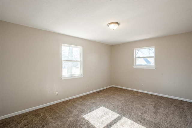 20 W Broadway, Ellsinore, MO 63937 - carpeted empty room with baseboards