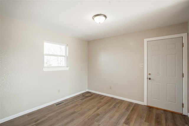 20 W Broadway, Ellsinore, MO 63937 - spare room featuring wood finished floors and baseboards