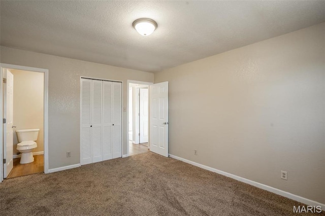 20 W Broadway, Ellsinore, MO 63937 - unfurnished bedroom with carpet, a closet, and ensuite bathroom