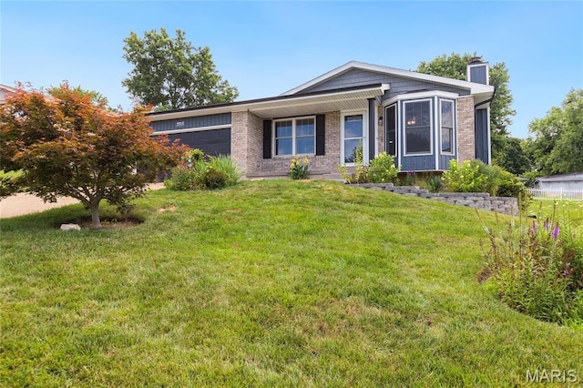 4012 Sunny Brook Dr, Arnold, MO 63010 - view of front facade featuring a chimney, an attached garage, a front yard, and brick siding