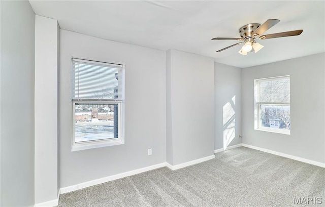 2922 S Compton Ave, Saint Louis, MO 63118 - spare room featuring ceiling fan, carpet flooring, and baseboards