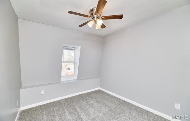 2922 S Compton Ave, Saint Louis, MO 63118 - unfurnished room featuring a ceiling fan, baseboards, and carpet flooring