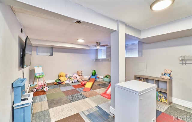 2922 S Compton Ave, Saint Louis, MO 63118 - finished basement featuring white refrigerator and baseboards