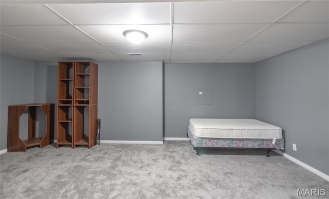 16855 Lemming Ln, Saint Robert, MO 65584 - carpeted bedroom featuring baseboards and a paneled ceiling