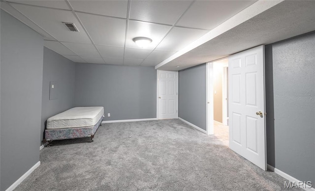 16855 Lemming Ln, Saint Robert, MO 65584 - carpeted bedroom featuring a drop ceiling and baseboards