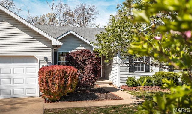 16855 Lemming Ln, Saint Robert, MO 65584 - view of front of property featuring roof with shingles and a garage