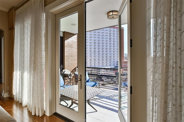 155 Carondelet Plz Unit 600, Saint Louis, MO 63105 - doorway featuring wood finished floors