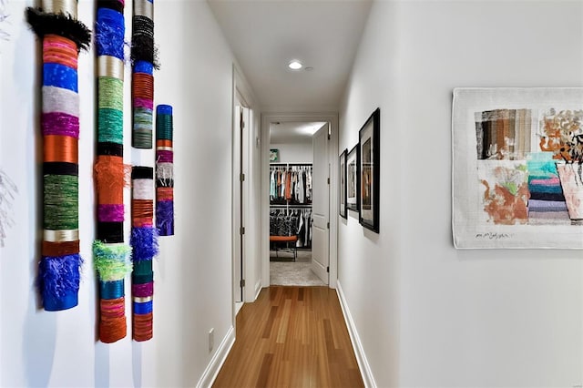 155 Carondelet Plz Unit 600, Saint Louis, MO 63105 - hallway featuring wood finished floors, recessed lighting, and baseboards