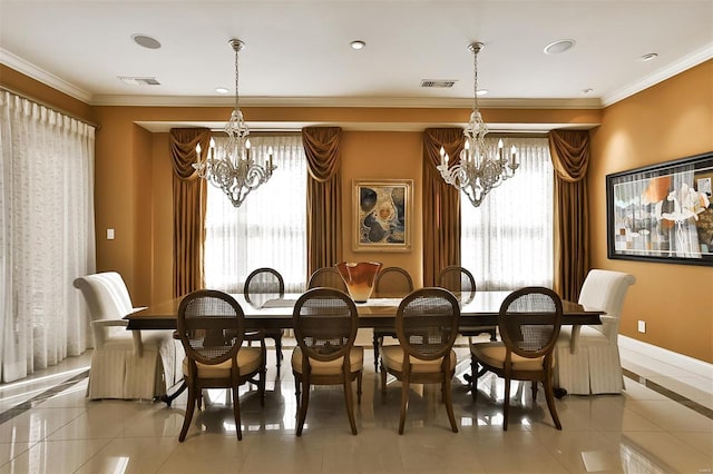 155 Carondelet Plz Unit 600, Saint Louis, MO 63105 - dining space featuring a chandelier, ornamental molding, baseboards, inlaid floor details, and light tile patterned flooring