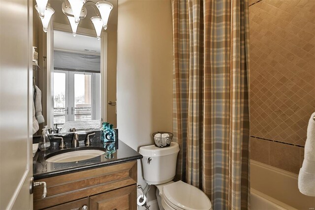 155 Carondelet Plz Unit 600, Saint Louis, MO 63105 - full bathroom with vanity, toilet, shower / bathtub combination with curtain, and a chandelier