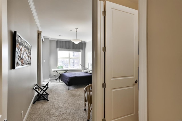 155 Carondelet Plz Unit 600, Saint Louis, MO 63105 - carpeted bedroom featuring crown molding and baseboards