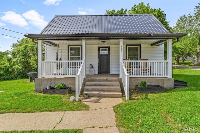 419 Murrill St, Bonne Terre, MO 63628 - bungalow with covered porch, a front yard, and metal roof