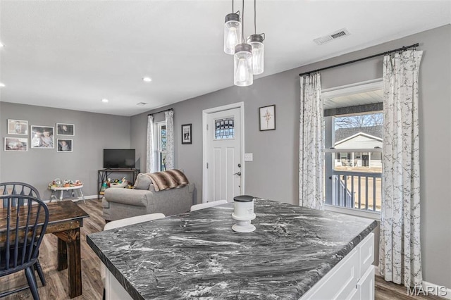 419 Murrill St, Bonne Terre, MO 63628 - dining room featuring dark wood-type flooring, recessed lighting, and baseboards