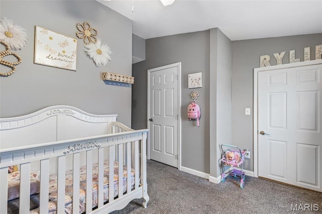 419 Murrill St, Bonne Terre, MO 63628 - carpeted bedroom with a crib and baseboards